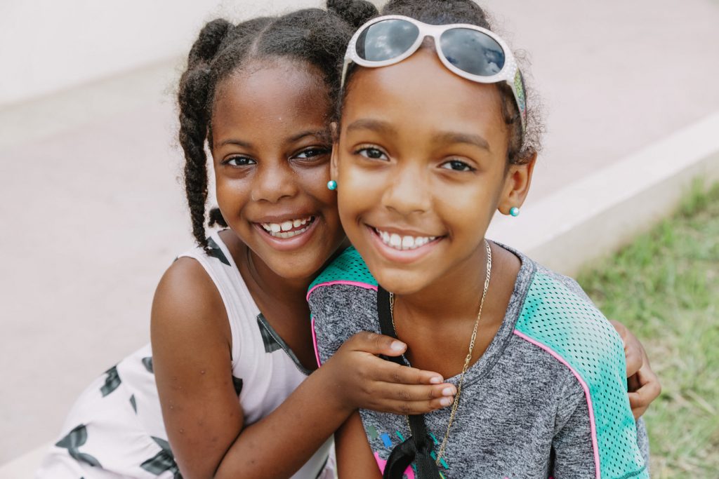 Cane Bay Partners volunteers distribute several thousand pounds of food, hundreds of LUCI solar lights and 6 pallets of water donated by St. Croix Foundation at Zion Christian Academy on Saturday, Nov. 11. Photo credit: Nicole Canegata http://nicolecanegata.com/