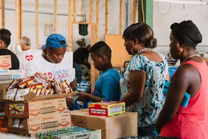 750 individuals and families received overflowing bags of food from Cane Bay Cares ahead of the Thanksgiving holiday Tuesday, Nov. 21 at Foundation Ministries. Photo credit: Nicole Canegata http://nicolecanegata.com/