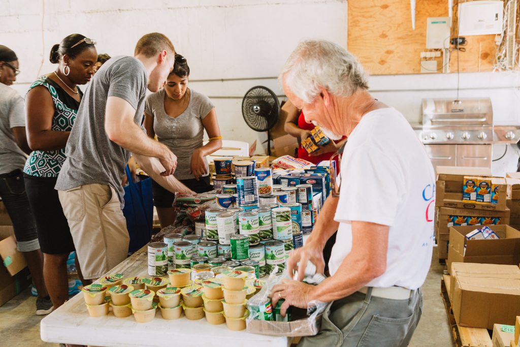 750 individuals and families received overflowing bags of food from Cane Bay Cares ahead of the Thanksgiving holiday Tuesday, Nov. 21 at Foundation Ministries. Photo credit: Nicole Canegata http://nicolecanegata.com/